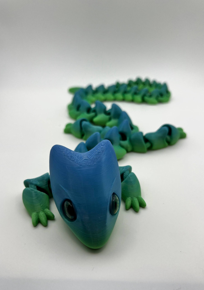 Ящерица с длинным хвостом